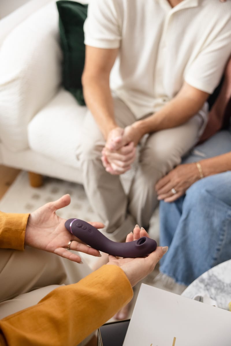 Dr Shannon hands holding Vibrator Device