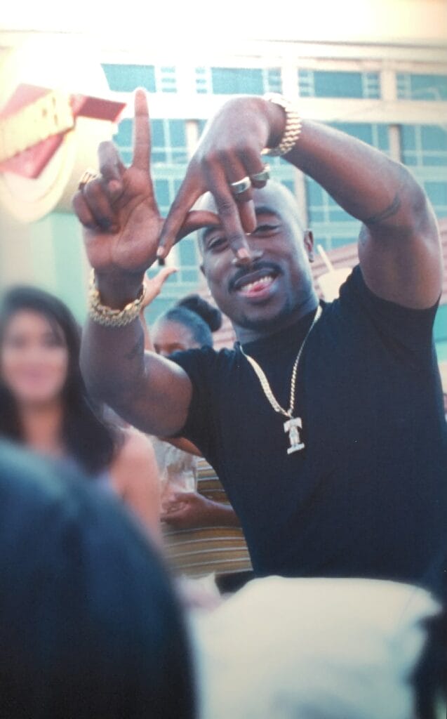 Tupac making LA sign Wake Me When Youre Free exhibit Los Angeles