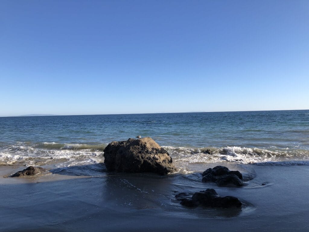 View of the ocean in Malibu, taken during a personal healing trip to release grief and reconnect with peace after an ectopic pregnancy and endometriosis surgery.