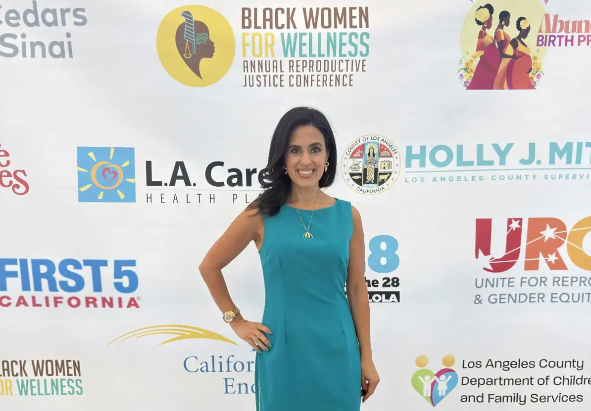 Doctor Shannon Chavez posing at the Black Women for Wellness event in Los Angeles, representing sexual wellness and women’s health advocacy.