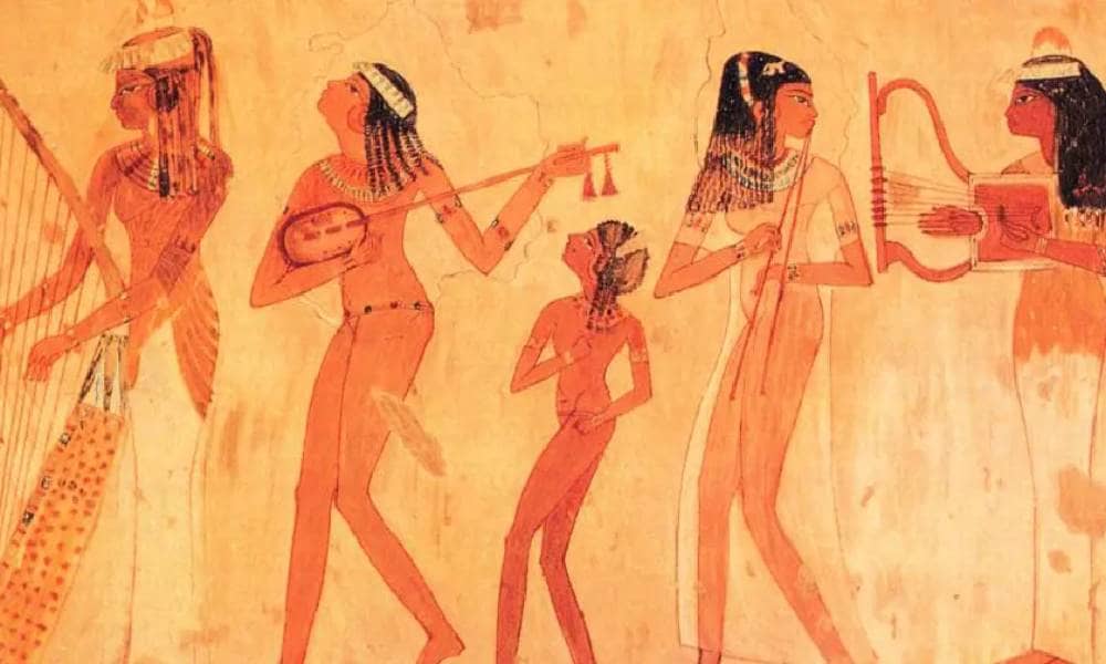 Painting of ancient Egyptian musicians and dancers from the Tomb of Nebamun in Thebes, showing sensual joy and celebration.